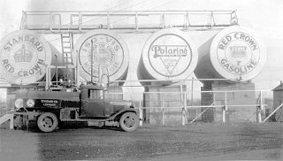 Red Crown gasoline tanks.
